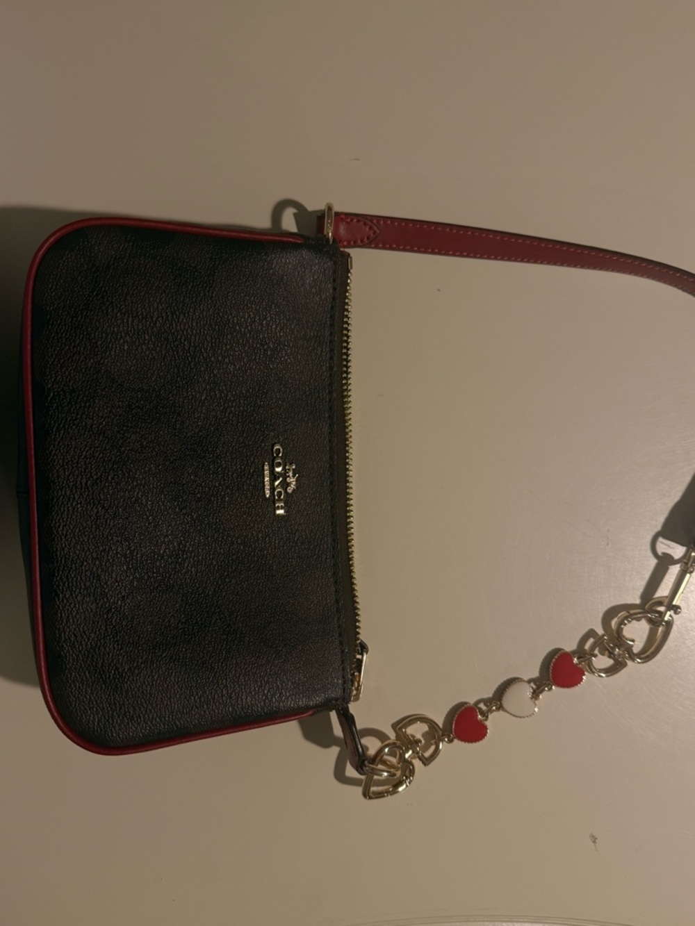 Coach Black Leather Crossbody Wristlet with Red Trim and Heart Charm Chain
